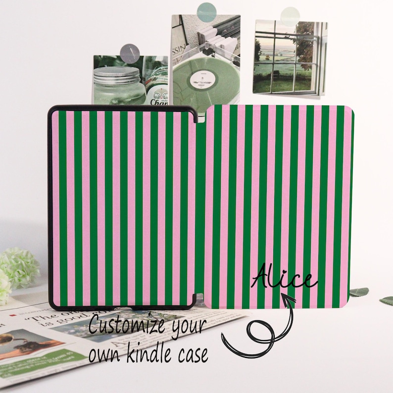May include: A Kindle case with a vertical striped pattern in green and pink. The case is black-edged and features the name "Alice" in cursive. The text "Customize your own kindle case" is also visible.