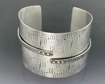 2" wide textured Sterling Sover cuff, tapers on the bottom side