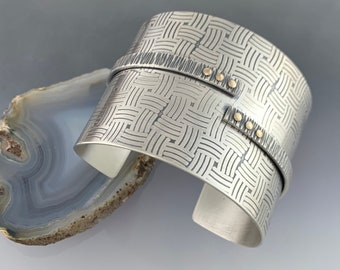 2" wide textured Sterling Sover cuff, tapers on the bottom side