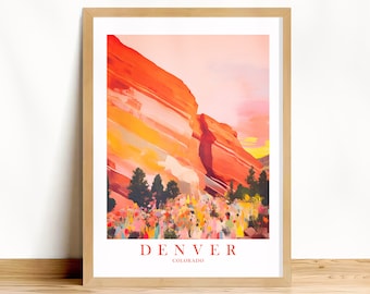 May include: A framed print of a colorful illustration of a red rock formation with a sunset sky. The text "DENVER COLORADO" is at the bottom of the print.