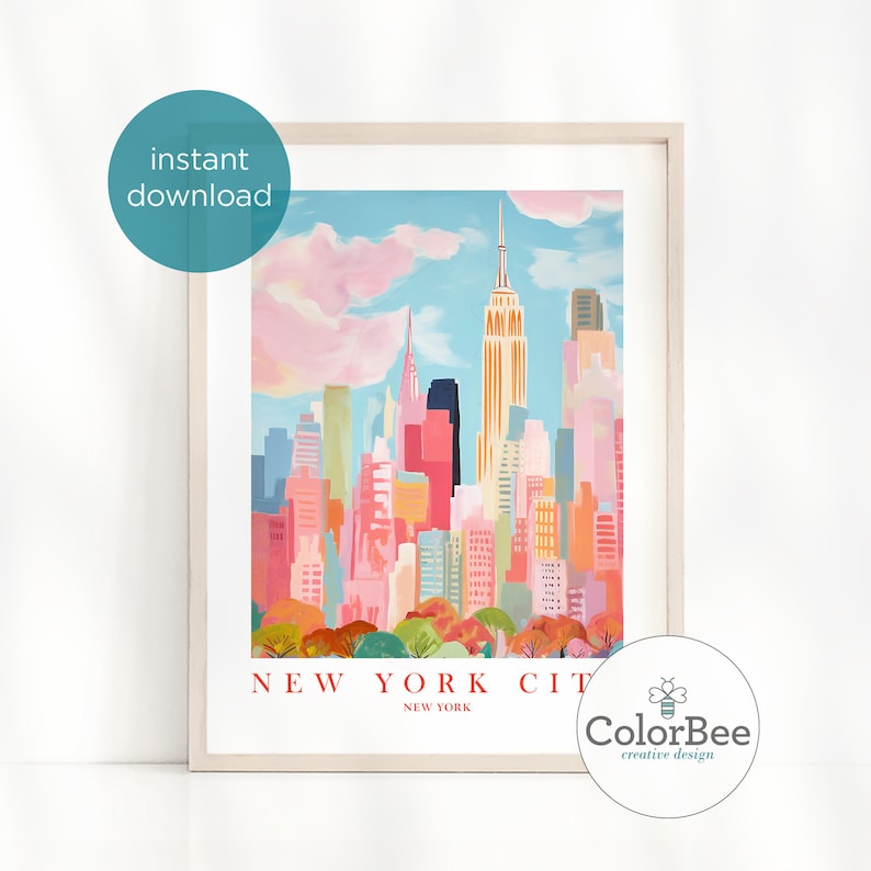 May include: A colorful illustration of the New York City skyline with the Empire State Building in the center. The buildings are painted in shades of pink, orange, yellow, and blue. The sky is a light blue with fluffy white clouds. The text "NEW YORK CITY" is printed below the image.
