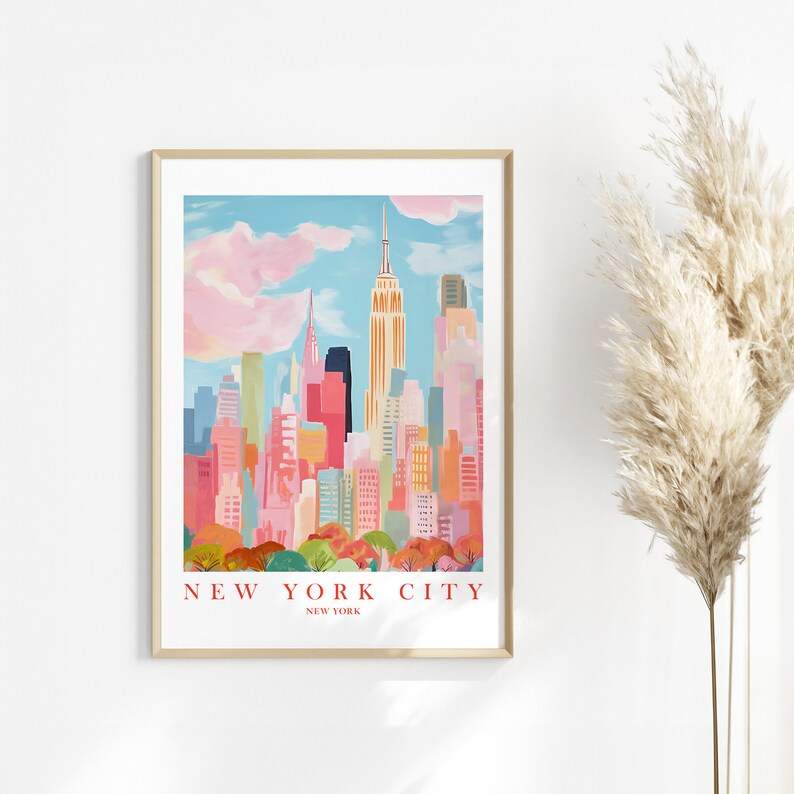 May include: A colorful illustration of the New York City skyline with the Empire State Building in the center. The illustration is in a frame with the text "NEW YORK CITY" and "NEW YORK" below the skyline.