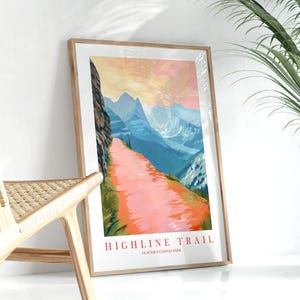 May include: Framed art print featuring a scenic mountain landscape with a pink trail winding through the scene. The sky transitions from orange to pink, with blue mountains in the background. The text "HIGHLINE TRAIL" and "GLACIER NATIONAL PARK" are printed at the bottom.