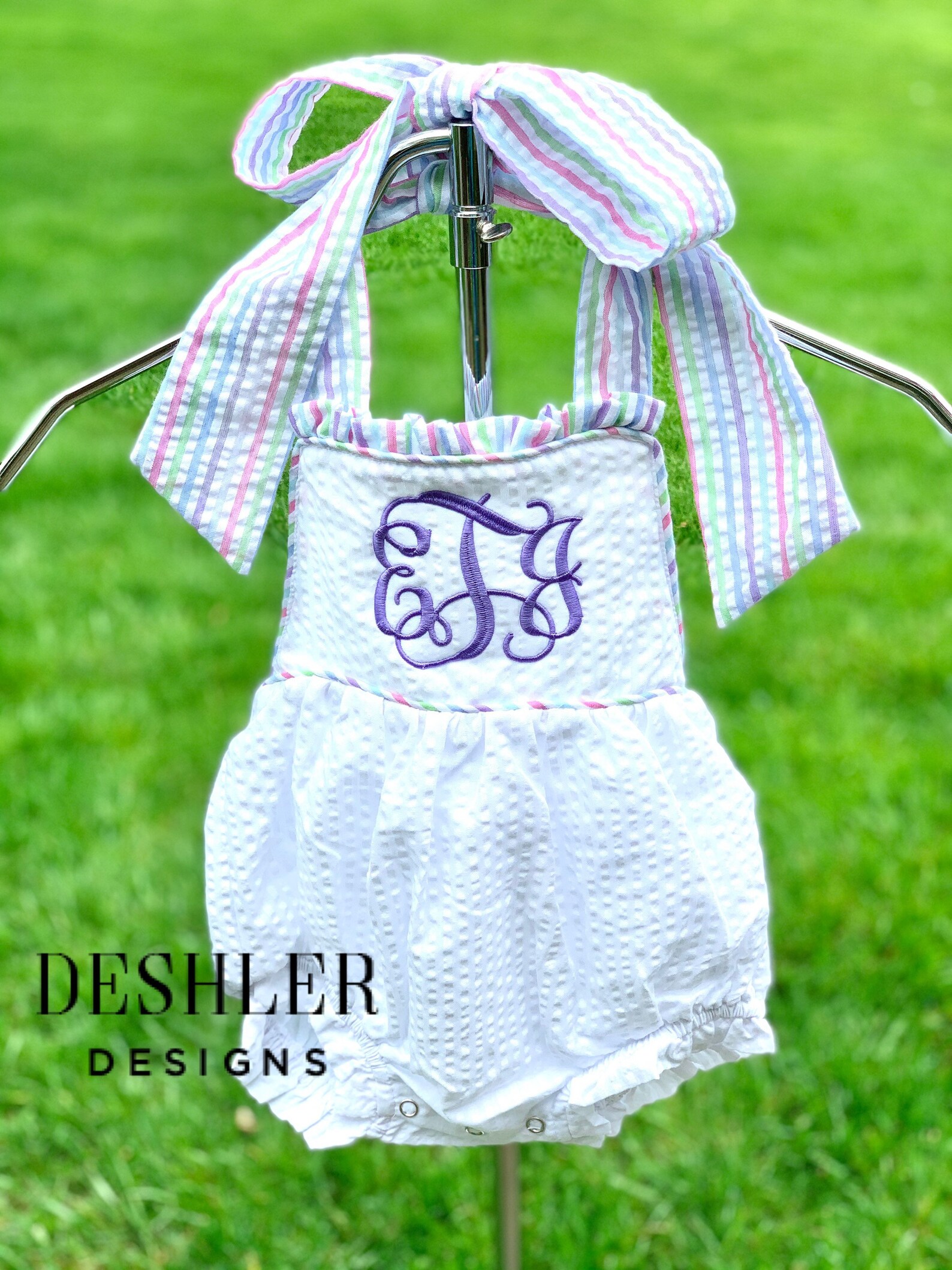 Pink Seersucker Bow Bubble Woven Romper by RuffleButts main image 1