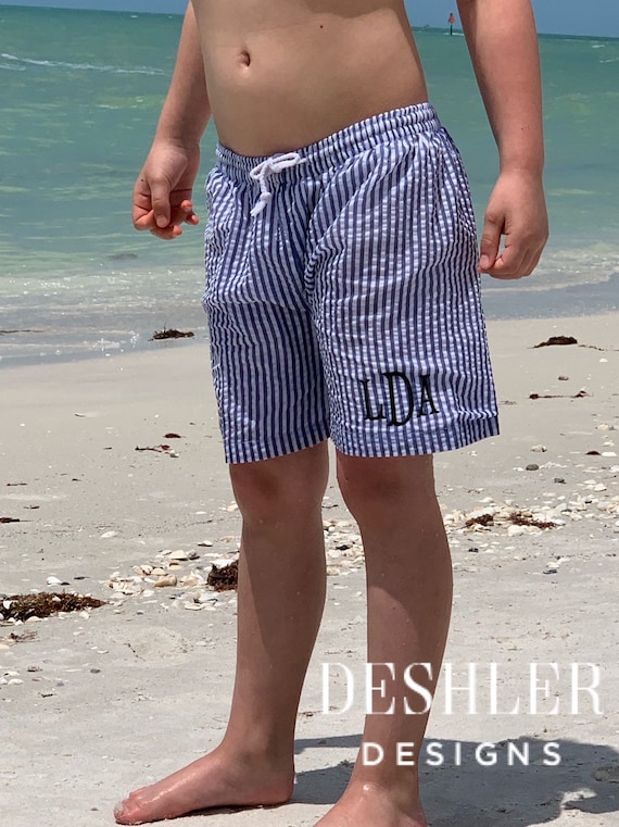 monogram swim trunks