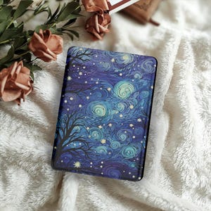 May include: A rectangular case with a starry night design in shades of blue, teal, and white. The artwork features swirling patterns, stars, and a silhouetted tree. The case is set against a soft, white, textured background.