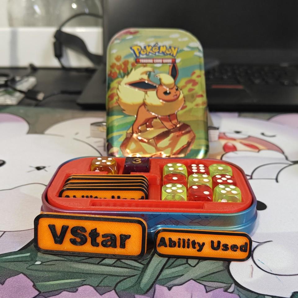 Pokémon Prismatic Evolutions Mini Tin Dice Organizer With Ability Used Markers - No cards
