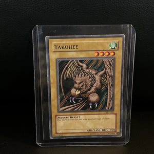 Takuhee - TP2-022 - Comune - Pacchetto Torneo Edizione Illimitata 2 Carte Collezionabili Yu-Gi-Oh