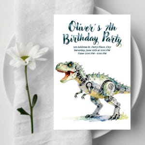 May include: A white invitation card with the text "Oliver's 7th Birthday Party" and event details. The card features a watercolor illustration of a robotic dinosaur. A white daisy and napkin are in the background.