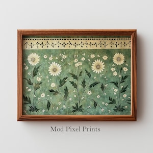 May include: A framed print featuring a floral design with large white daisies and smaller white flowers on a green background. The print has a decorative border and is set in a brown wooden frame. The text "Mod Pixel Prints" is at the bottom.