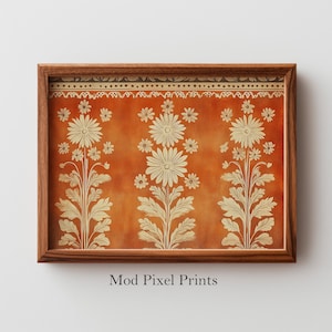 May include: Framed art print featuring a floral design with large white flowers and smaller blossoms on an orange background. The print is in a wooden frame. The text "Mod Pixel Prints" is at the bottom.
