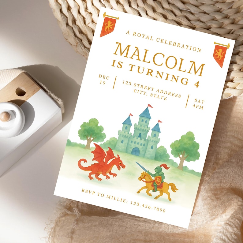 May include: A white invitation card with the text "A ROYAL CELEBRATION MALCOLM IS TURNING 4". The card features a watercolor illustration of a castle, a red dragon, and a knight on a horse. The invitation includes the date, time, and RSVP information.