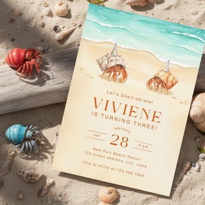 May include: A beach-themed birthday invitation with the text "Viviene is turning three!" featuring watercolor illustrations of hermit crabs wearing party hats. The invitation is surrounded by seashells and sand.