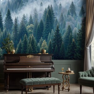 May include: A grand piano with a dark wood finish and a matching bench is set against a forest mural. The room also features a green velvet armchair and a small side table with decorative elements. The background is a scenic forest wallpaper.