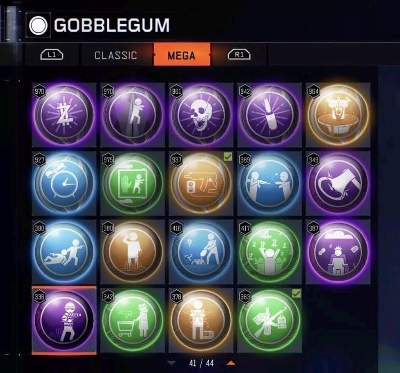 Pode incluir: Uma tela exibindo uma sele&ccedil;&atilde;o de itens "Gobblegum", cada um representado por um &iacute;cone circular com um gr&aacute;fico e um n&uacute;mero exclusivos. A aba "MEGA" est&aacute; destacada. Os &iacute;cones apresentam v&aacute;rias cores e designs, como uma caveira, um rel&oacute;gio e uma pessoa.