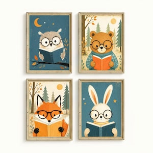 May include: A set of four framed wall art prints featuring an owl, a bear, a fox, and a rabbit. Each animal wears round black glasses and holds an open book. The illustrations use a colour palette of blue, orange, brown, and cream tones.