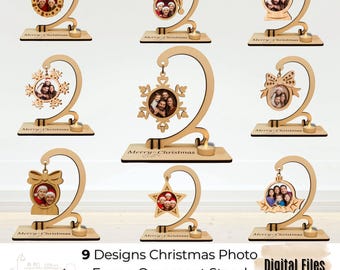 May include: Nine wooden Christmas photo frame ornament stands in various shapes, including a star, snowflake, and bow. Each stand holds a photo and has a curved support. The text "Merry Christmas" is engraved on the base. The image also includes the text "9 Designs Christmas Photo Frame Ornament Stand Bundle Laser Cut".