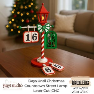 May include: A festive Christmas countdown street lamp in red, white, and green, displaying the number 16. The lamp has a red top, a green bow, and a green window. The base has the numbers 6 and 5. The text "Days Until Christmas" is visible.