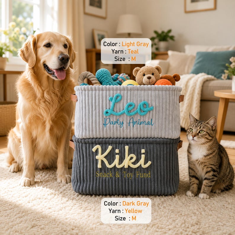 May include: Two stacked corduroy storage baskets. The top light gray basket features teal embroidery reading 'Leo Party Animal'. The bottom dark gray basket features yellow embroidery reading 'Kiki Snack & Toy Fund'. Both baskets have brown side handles.