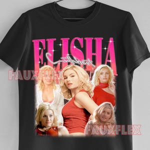 May include: Black t-shirt featuring a collage of images of Elisha Cuthbert with the name "Elisha Cuthbert" in pink, outlined in white. The shirt also has the text "Fauxflex" in white.