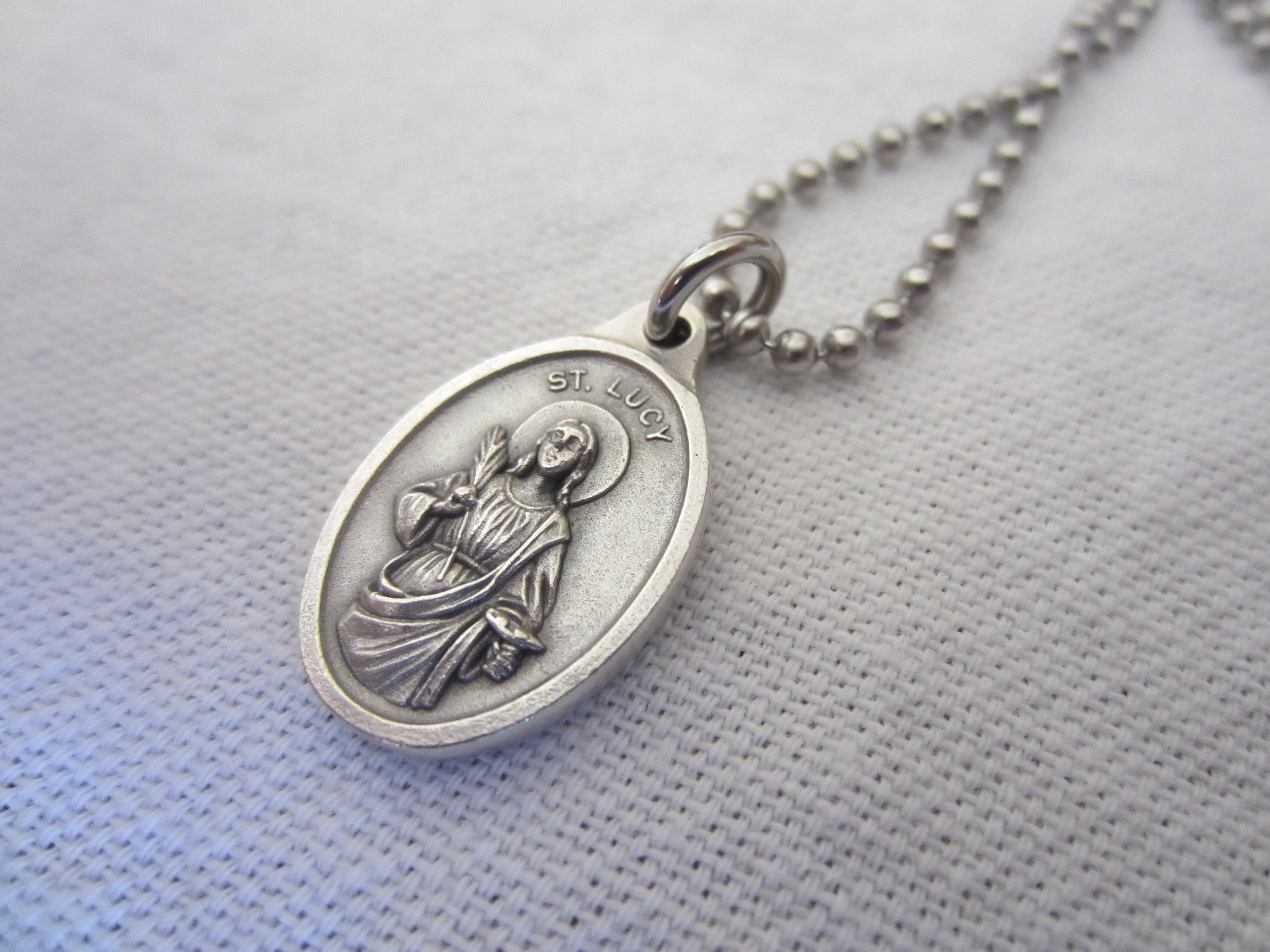 7/8 Inch Sterling Silver Oval St. Lucy Medal, Patron Saint Of The Blind