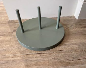 Wood base for displaying giant paper flowers