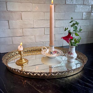 Large Hollywood Regency vintage oval mirrored vanity tray with ornate filigree