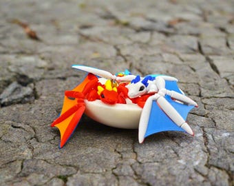 Fidgets articulados de dragón de fuego y hielo