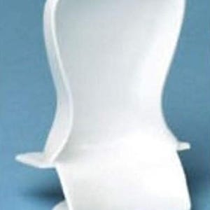 May include: White plastic chair with a curved back and a wide seat. The chair has a simple design and is made of a lightweight material.