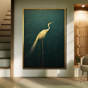 May include: A framed artwork depicting a white crane with long, flowing tail feathers against a dark teal backdrop. The crane is perched on a thin gold line, with a gold frame. The artwork is displayed in a room with a staircase and a chair.