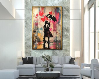 May include: A rectangular wall art piece featuring a silhouette of a couple standing under a black umbrella. The background is a vibrant mix of colorful paint splatters and drips, accented by several bright red heart shapes floating above.