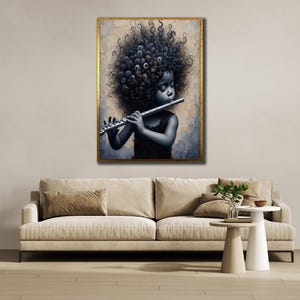 May include: A framed art print showing a child playing a flute. The child has dark skin and a large, textured hairstyle. The artwork is in shades of blue and grey, with a gold-coloured frame. The background has a textured, neutral tone.