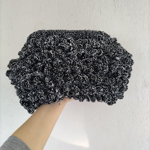 black and white knitted clutch, puffy bag