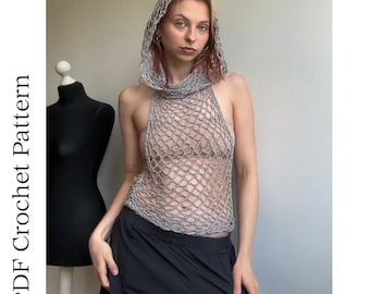 May include: A silver metallic crochet hooded halter top with an open net stitch pattern. The garment features a hood and a sleeveless design. The text "PDF Crochet Pattern" is visible on the left side of the image next to a black mannequin.