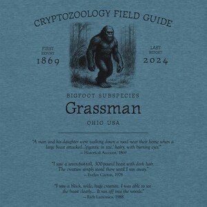Grassman Bigfoot Shirt – Ohio Cryptid Tee Featuring Nest Background for Folklore Fans, Midwest Monster Hunters, and Forest Mystery Lovers