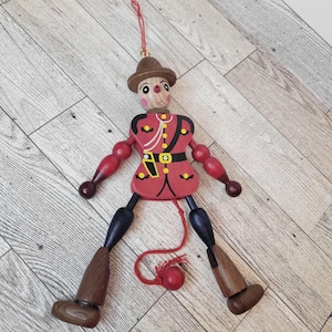 VTG Wooden Canadian Mountie Jumping Jack Pull Toy Articulated Legs Ornaments
