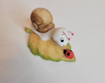 Vintage HOMCO Anthropomorphic Snail on Leaves W. Ladybug Ceramic Figurines