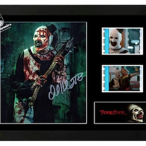 Terrifier Film Cell Display Atemberaubende signierte Kunst the Clown Memorabilia + COA Original poster design by Jeff Harris