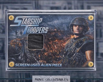 Screen-Used Alien Fragment – Starship Troopers Movie Prop Display – Authentic Sci-Fi Memorabilia Collectible