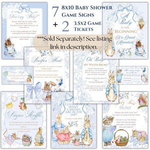 May include: A set of 9 printable baby shower game signs featuring a blue and white Peter Rabbit theme. The signs include games like "Don't Say Baby", "Pacifier Hunt", "Oh Baby! My Water Broke", "Diaper Raffle", "Guess How Many Candies Are in the Jar", "Baby Sock Hunt", and "How Many Candies Are in the Jar?"