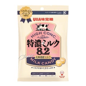 May include: A bag of UHA Milk Candy with a pink and white design. The bag features a cow and a windmill, and the text "High Conc. Special Milk 8.2 Hokkaido Milk Candy" is printed on the front. The bag also includes a picture of three milk candies.