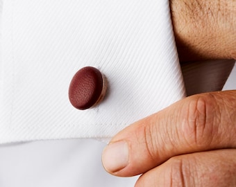 Vintage Ox Blood leather covered cufflinks.