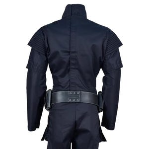 May include: A dark navy blue costume with a high collar and a wide black belt. The costume features structured shoulder details and a belt with three silver-colored rivets. The outfit appears to be a uniform or a cosplay ensemble.