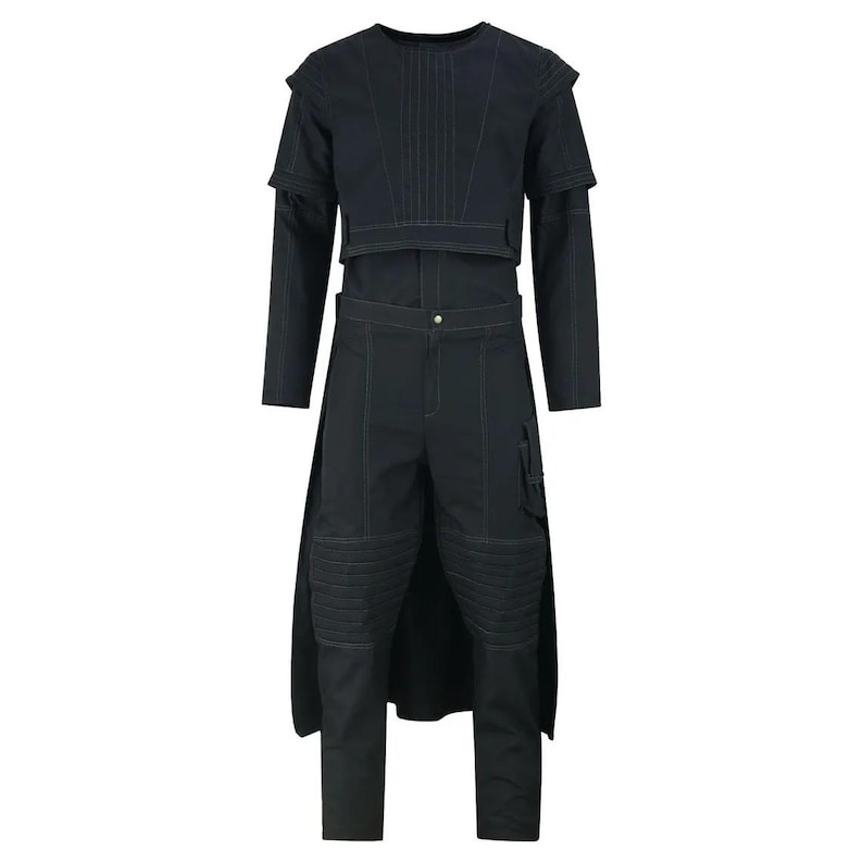 May include: A black outfit with white stitching. The outfit includes a long-sleeved top with a short-sleeved overlay, and trousers with knee padding and a cargo pocket. The outfit has a unique design with a button closure on the trousers.