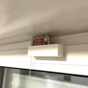 Soporte para caja de batería: una solución limpia para la iluminación de ventanas (tamaño y color a gusto del usuario)