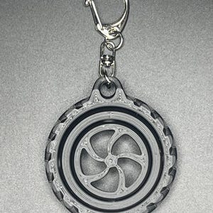 Tire fidget spinner keychain