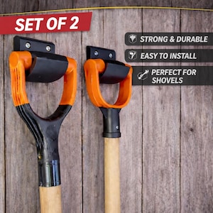 May include: Heavy-duty tool holders, set of 2, with black and orange accents. The holders are designed to securely hold shovels. The image also includes text that says "Strong & Durable" and "Easy to Install".