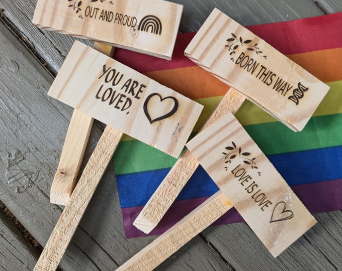 Show your PRIDE every day with plant + garden signs! Out and PROUD! Super cute & Custom Available!