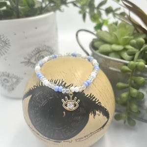 Blue Cloudy Glass Bracelet + Evil Eye