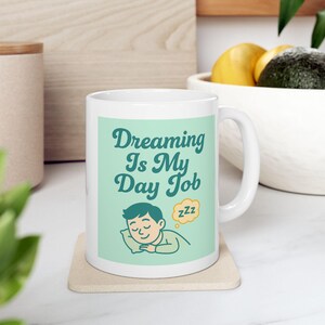 Funny Sleepy Coffee Mug - Dreaming Is My Day Job Cup - Cute Gift for Nappers - Lazy Day Humor Mug - Sarcastic Coffee Lover Gift 11oz
